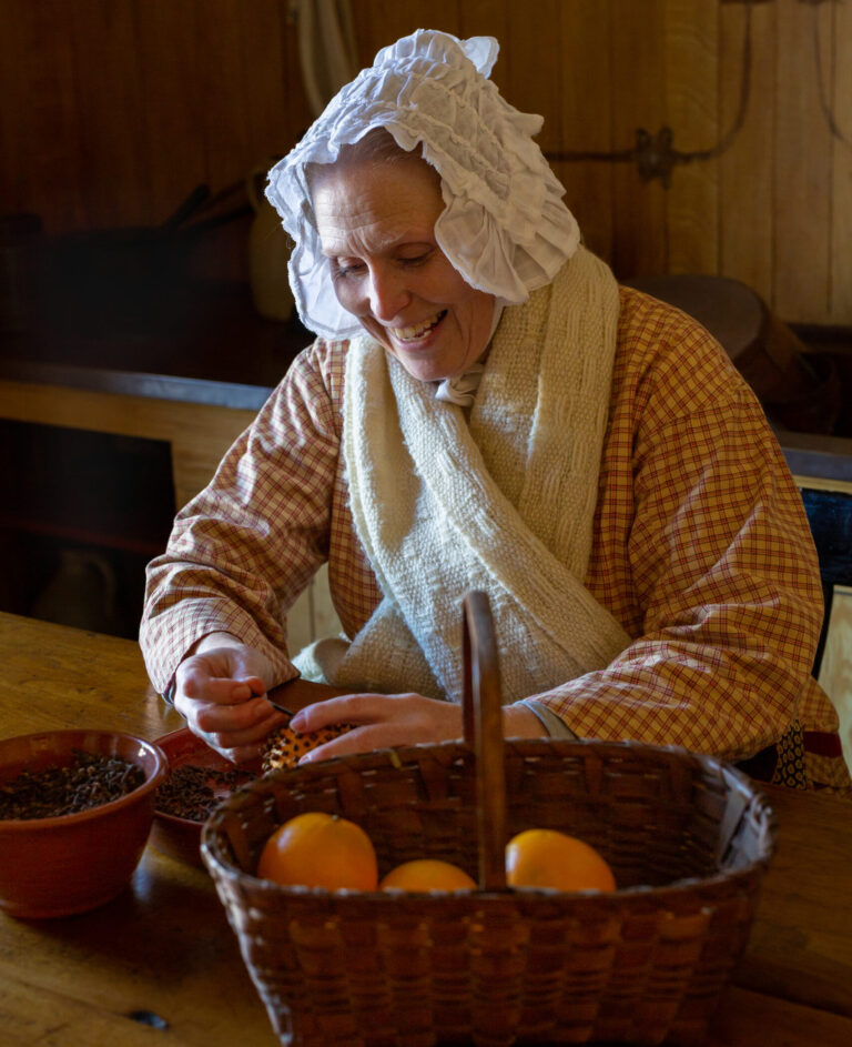 Woman making a pomander